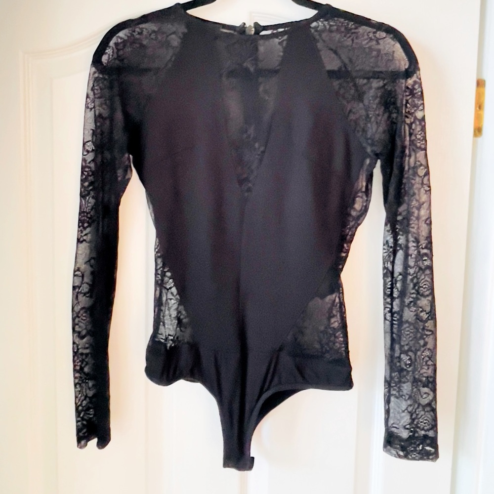 BEBE Black Sexy Lace Bodysuit. Excellent condition.